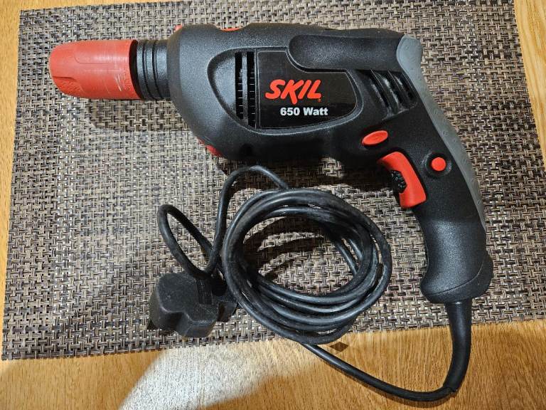 Skil Hammer Drill 650Watt (model 6692), Dust filter + Multi-functional Skillaser