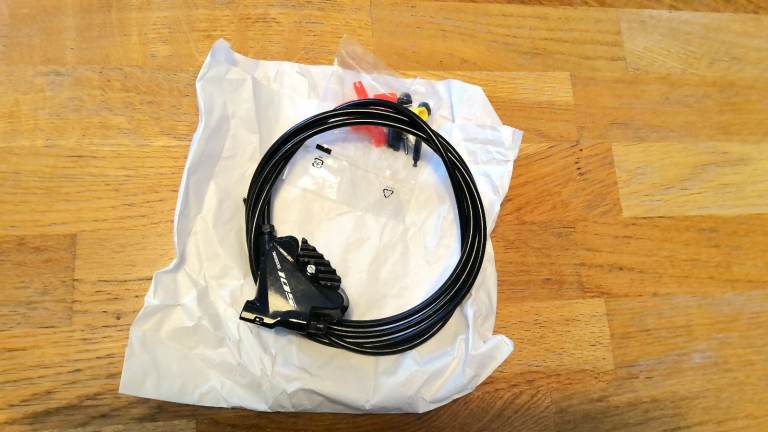 Shimano 105 flat mount calliper; left rear; black × 1