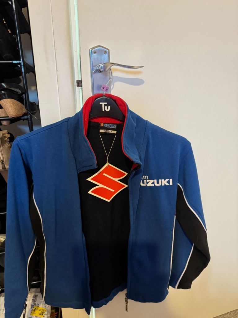 Suzuki motorbike jacket, unisex size small never worn brand-new