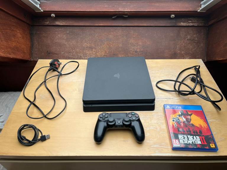 PlayStation 4 slim 500Gb with one controller and Red Dead Redemption 2 disc for sale