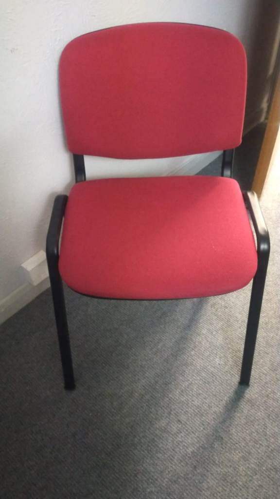 Red upholstered heavy duty visitor reception meeting office stacking chair with black legs £20
