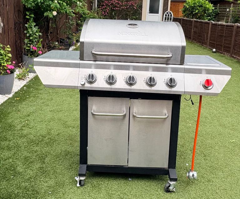 Nexgrill 5 Burner Gas Grill with Gourmet Plus Cooking System.