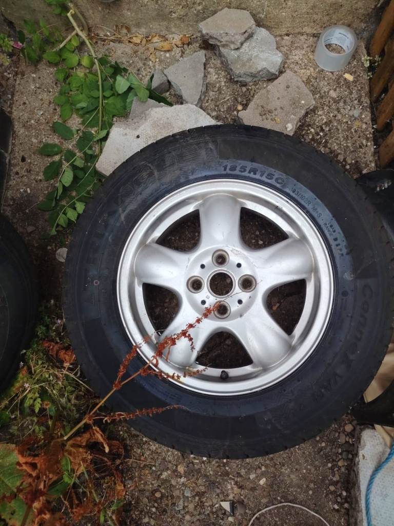 set of 2 alloys 4 stood with brand new tyers 185r 15