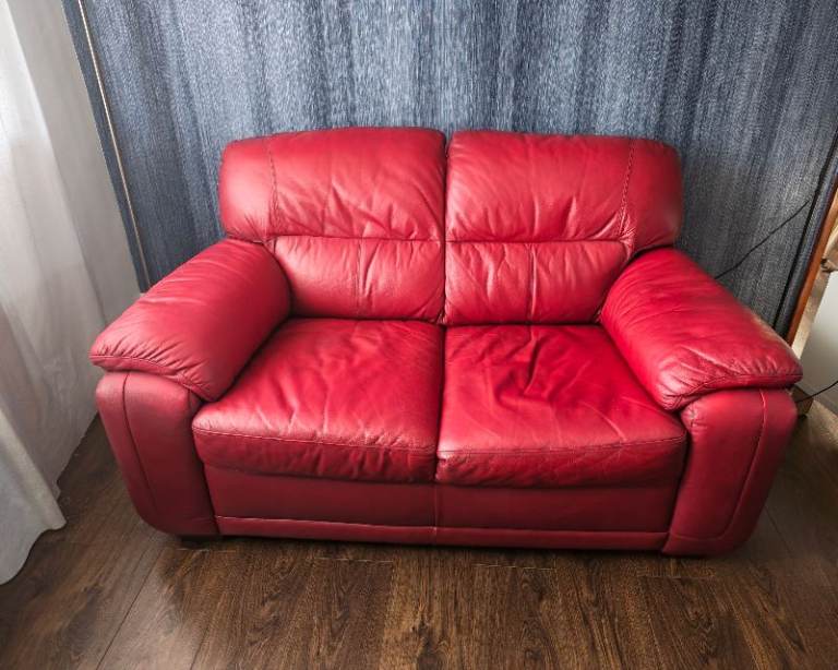 Red Leather Two-Seater Sofa – Good Condition