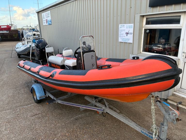Orange 5M RIB with 4-Stroke Outboard and Road Trailer