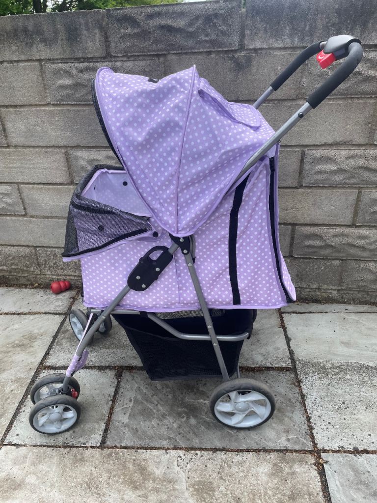 Dog pram, folding with rain cover.