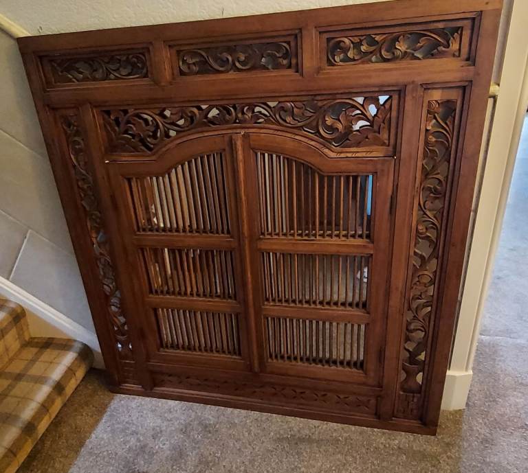 Traditional Balinese Wall Mirror Featuring Intricately Carved Teak Wood Shutters
