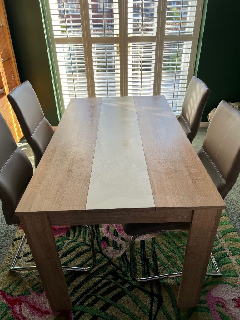 Steinhoff dining table and 4 chairs