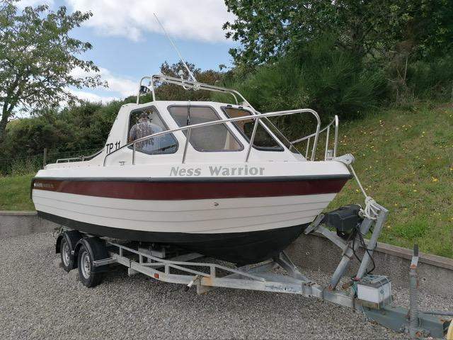 Warrior 195 Fast Fisher and 4 Wheel trailer (Year 1999)