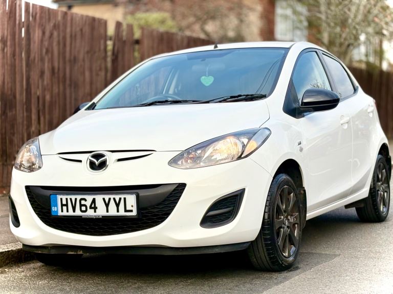 Mazda 2 1.3 petrol white edition 2014 low mileage 1YRS mot £35 annual tax