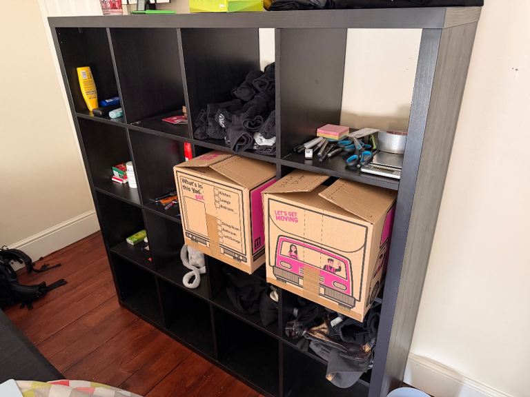 Black IKEA Kallax four by four storage unit - good condition