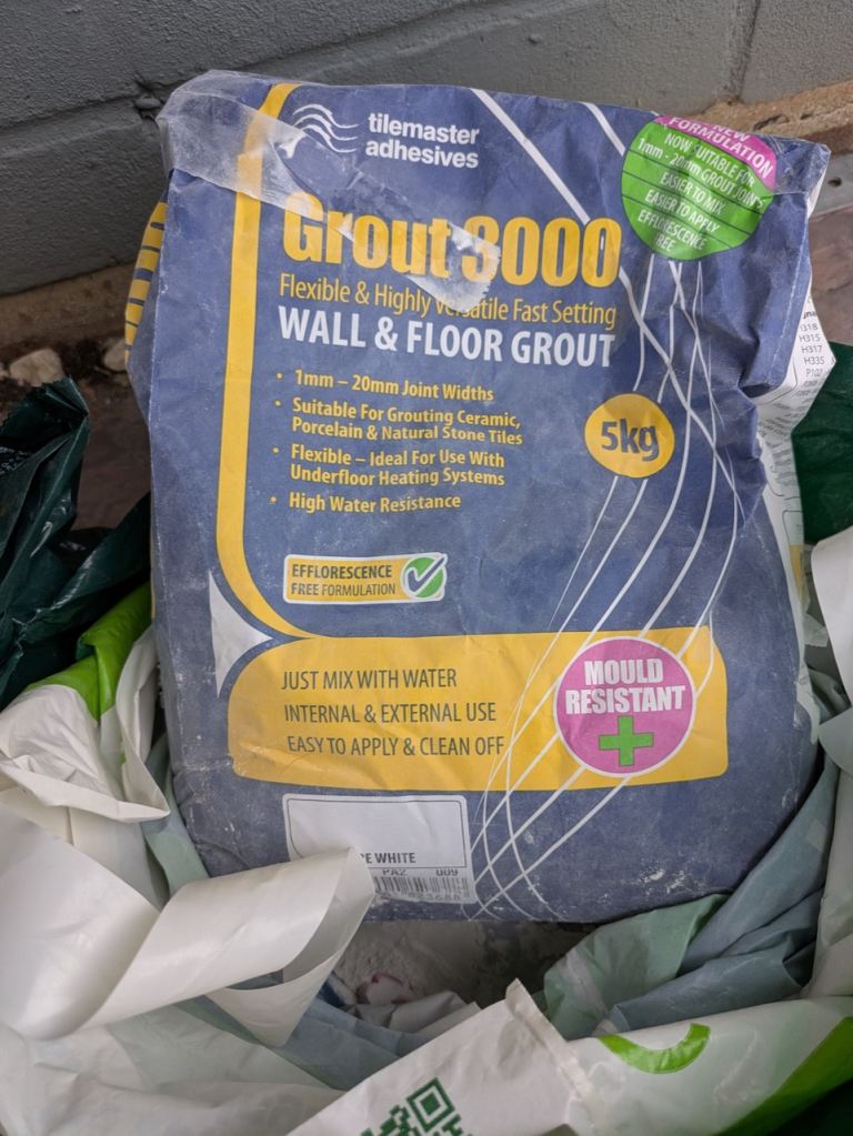 FREE half bag of white wall and floor grout