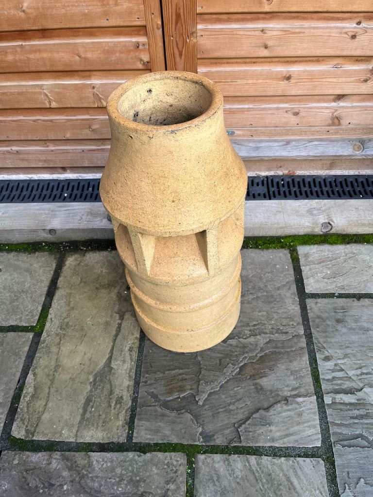 An attractive sand coloured chimney pot for the garden.