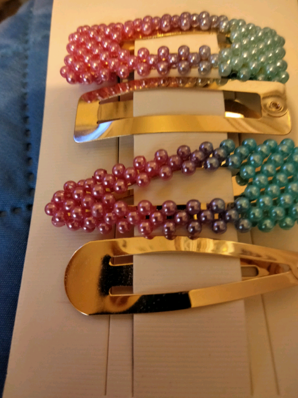 Assorted jewelry and hair clasps 