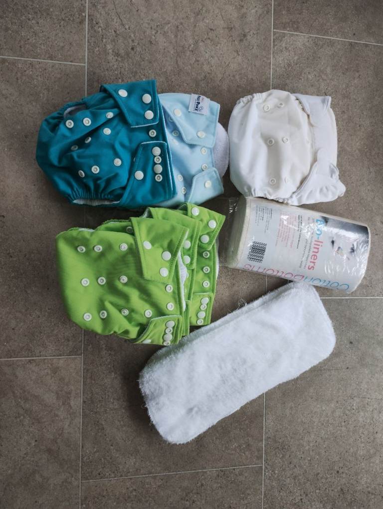 Reusable nappies and liners