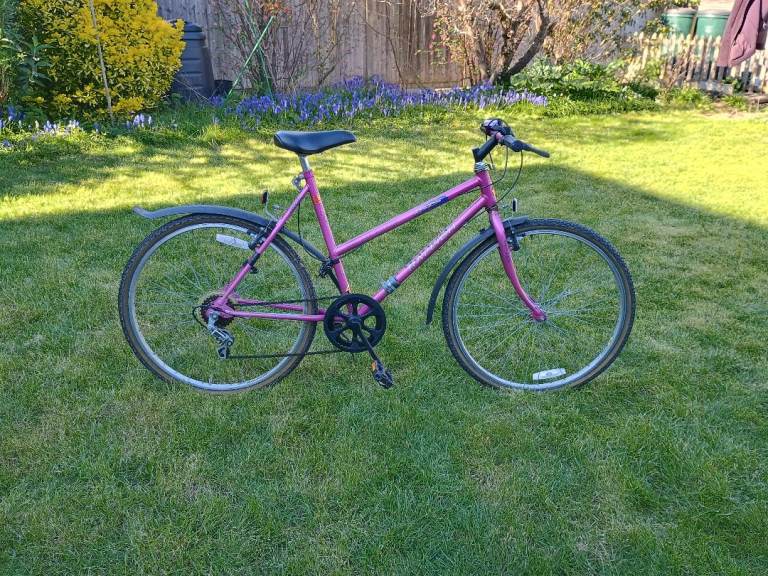 Bike: Raleigh hot pink bicycle teenager/ small ladies 
