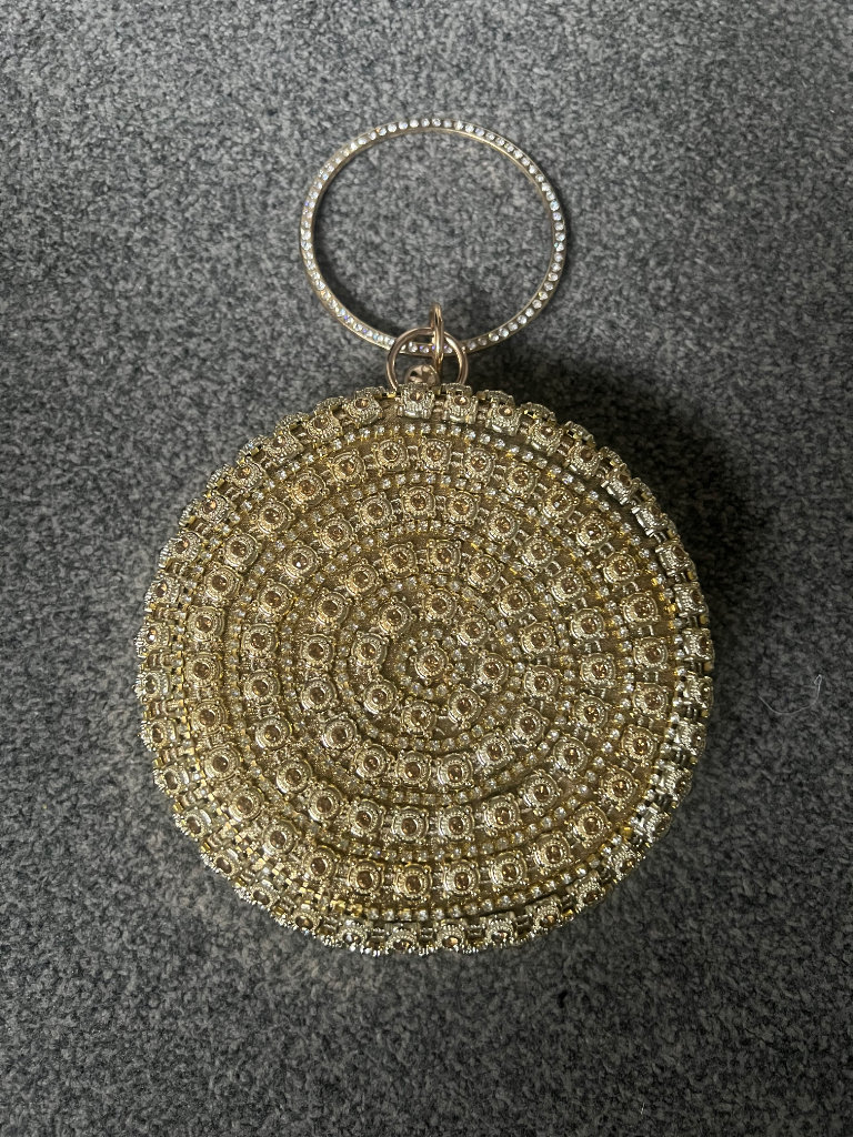 Brand New Clutch Bag in gold diamonte £25