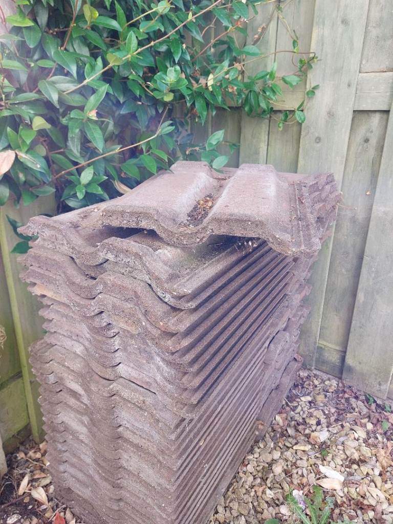 FREE TO COLLECT.   Concrete Double Roman Roof Tiles 
