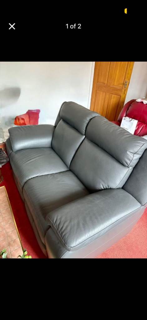 Two seater sofa dark grey. Never used Scs Italian leather
