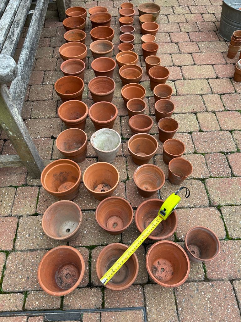 Selection of small and medium vintage terracotta pots
