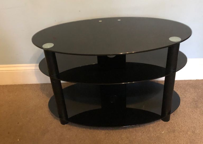 Stylish Oval Black Gloss TV Stand with Shelf H20in/5cm W32in/81cm D18in/46cm Good condition  C1