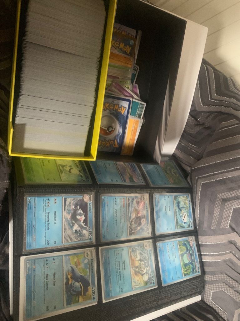 Large Collection of Pokemon Trading Cards in Binder and Box