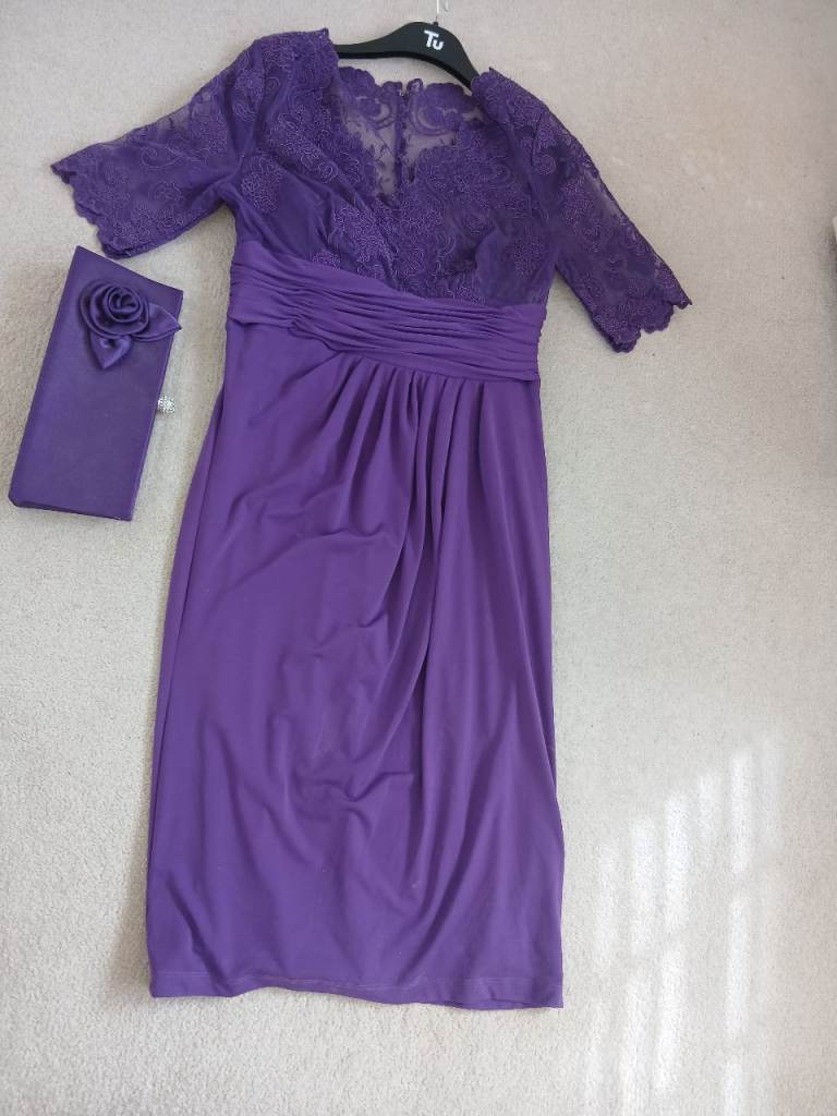 Beautiful purple jersey dress with matching  clutch bag
