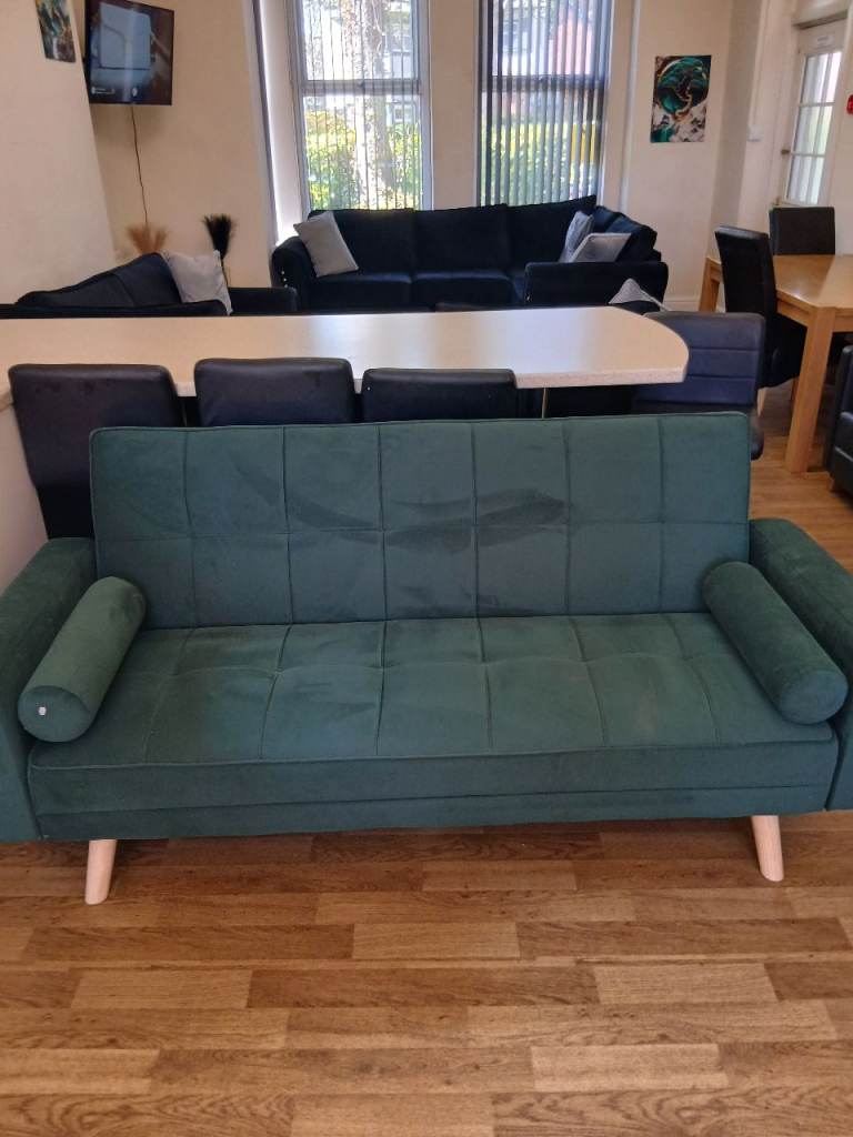 green fold down sofa bed