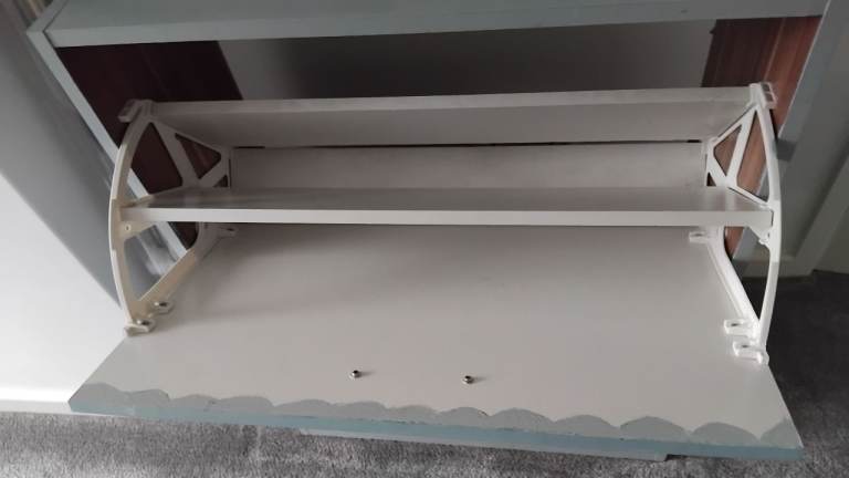 Handy shoe storage nicely decorated and painted 