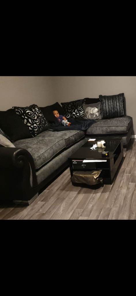 Large Black Corner Sofa with Cushions – Good Condition