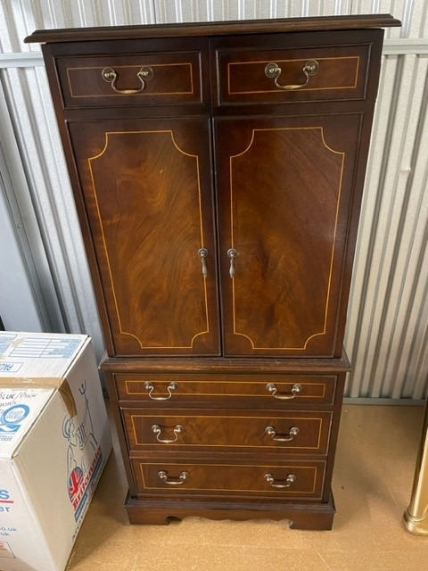 Flame mahogany chest with draws for sale , collection from Kingston area. 