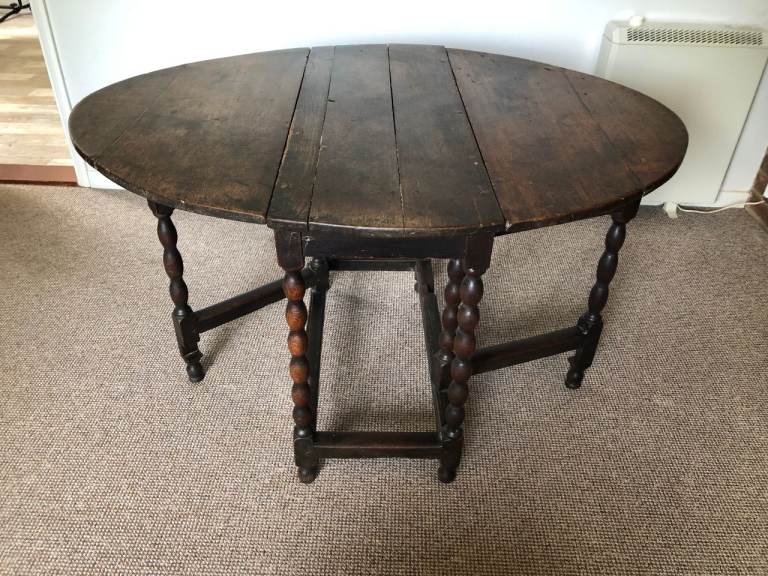 Antique oak gateleg drop leaf oval dining table with barley twist legs