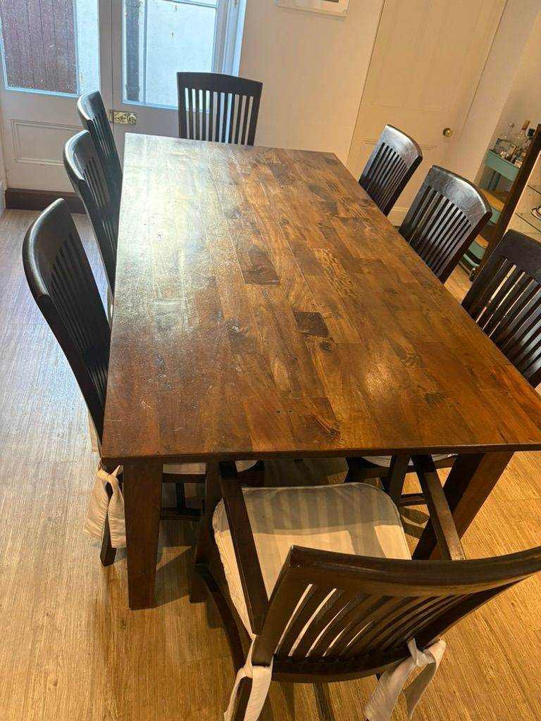 Solid Wood Dining Table and 8 Chairs – Good Condition