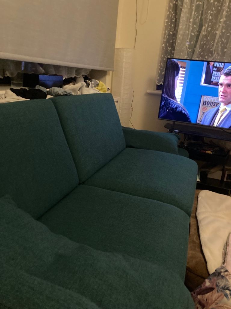 Comfortable Green Fabric Sofa – Good Condition