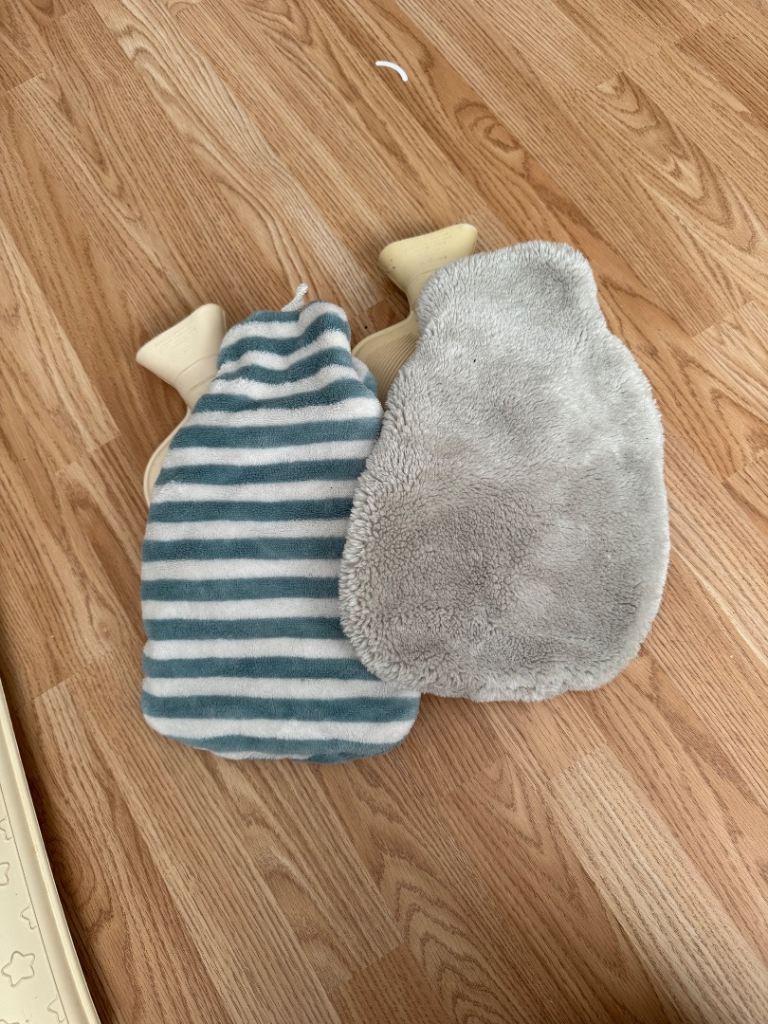 2 Hot Water Bottles With Covers 