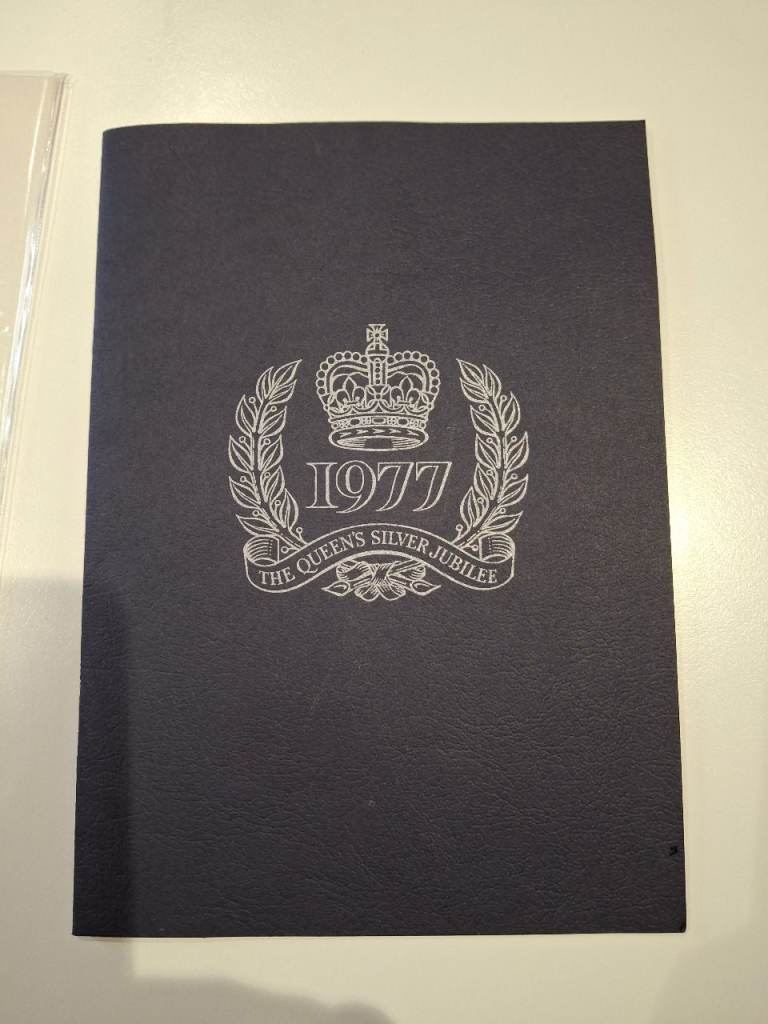 The Queen's Silver Jubilee Souvenir Stamp Album