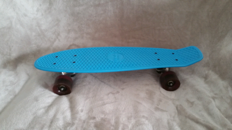 Skateboard brand new condition blue colour. 