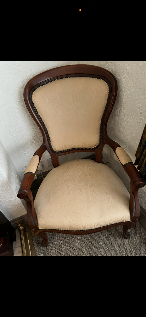 Victorian-style balloon-back armchair