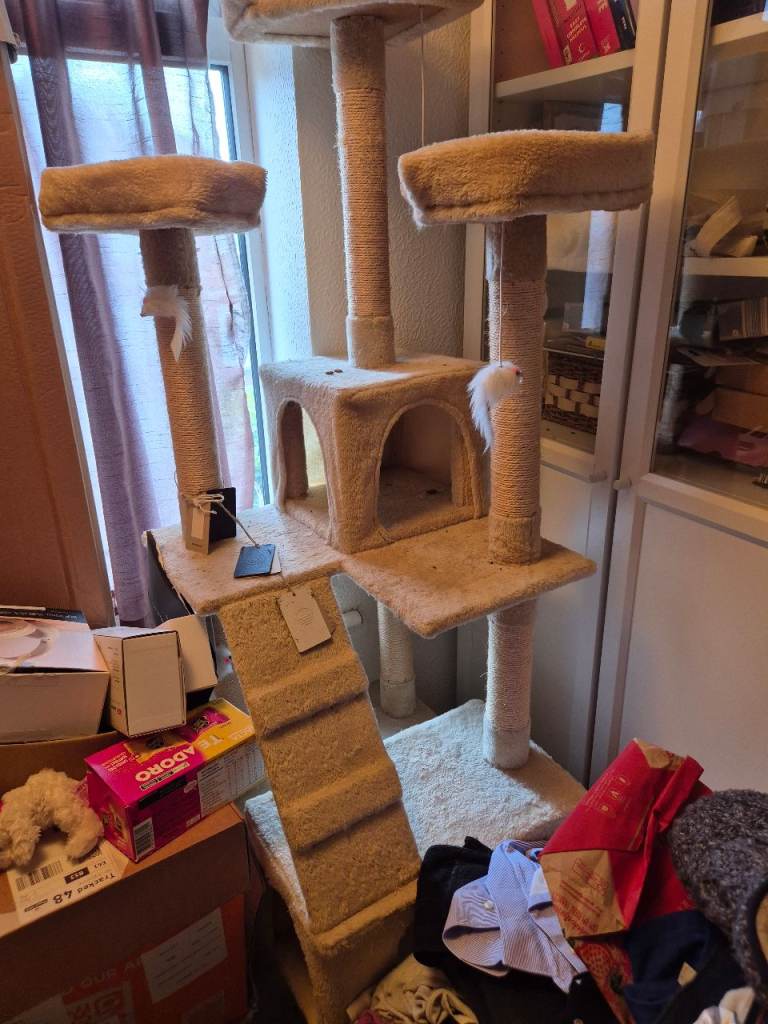 Cat tower with three toy mice