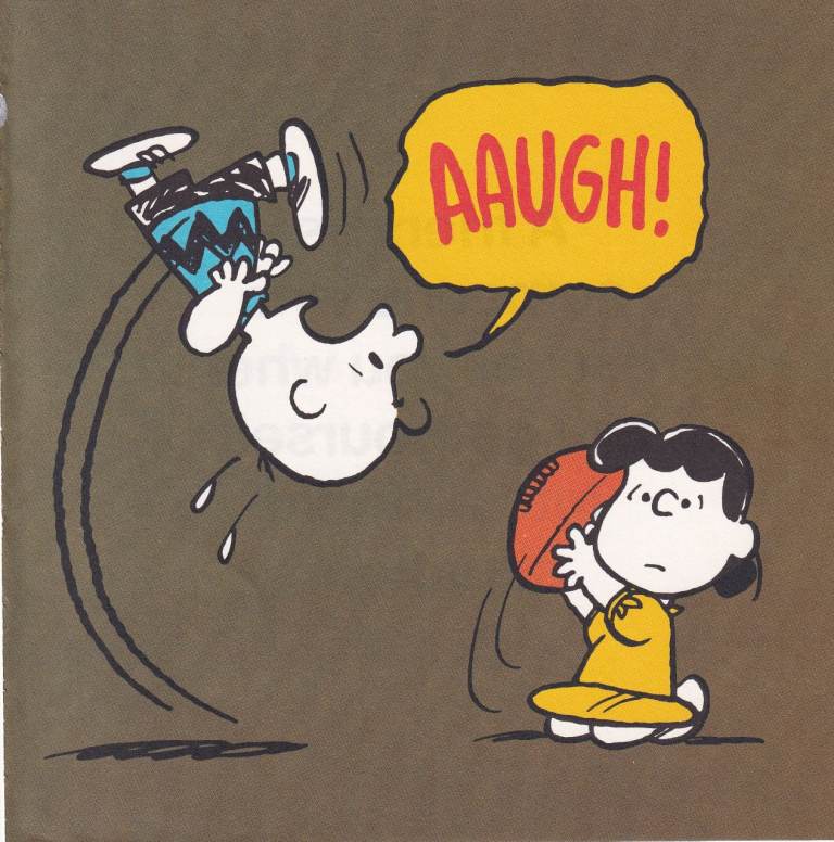 28. A Rare Original Print of CHARLIE BROWN AND LUCY PLAYING FOOTBALL - SNOOPY / PEANUTS