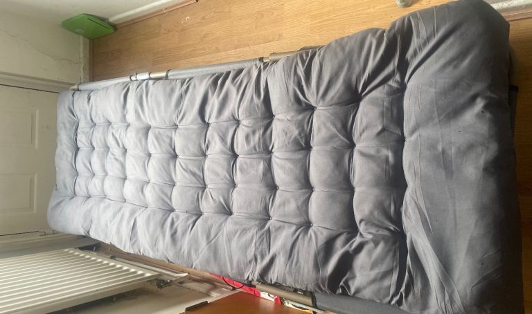 Grey fold up camping bed
