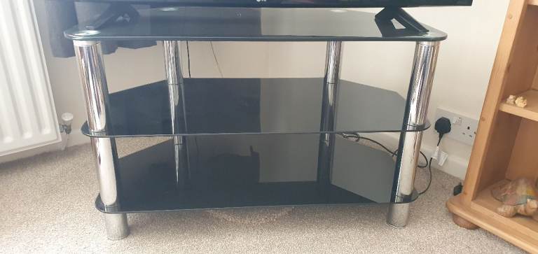 Black Glass TV Stand with Chrome Legs – Good Condition