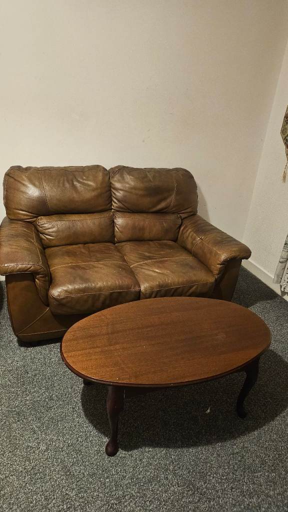 Leather sofa with coffee table