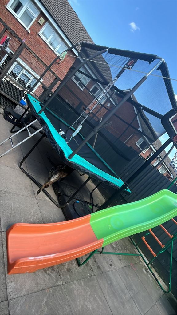 Trampoline and 10 ft slide 