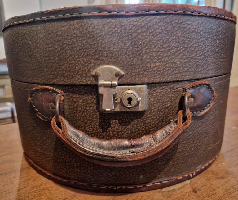vintage hat box, leather with fabric lining. Shabby chic.