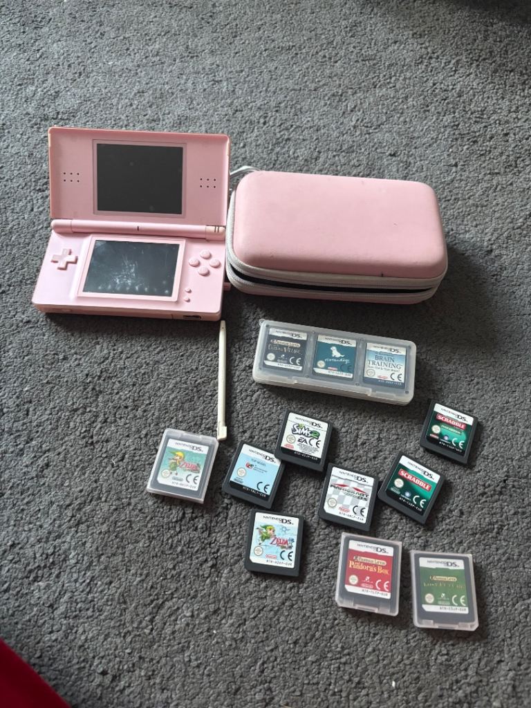 Pink Nintendo ds and games