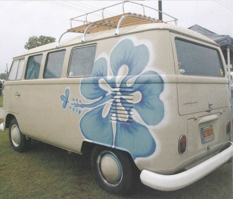 52. A framed magazine original featuring Very Early VW/Volkswagen Camper with BLUE FLOWER
