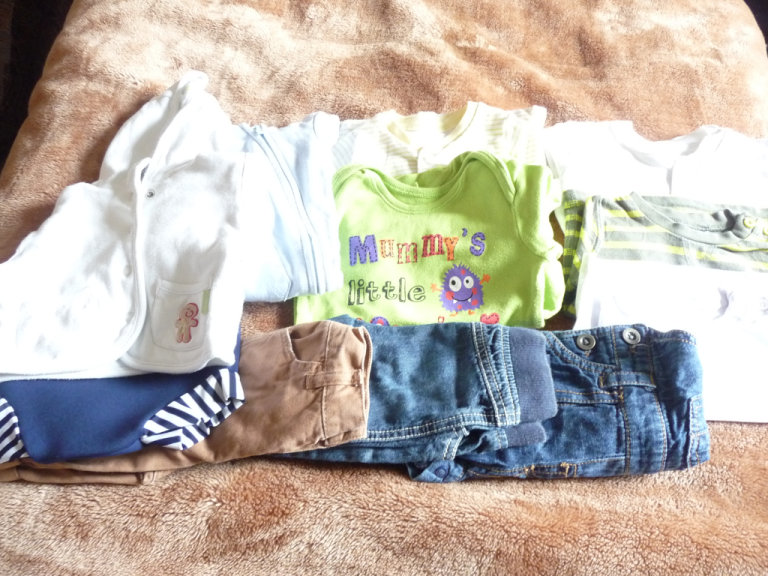ELEVEN ITEMS OF BABY  CLOTHES 0-3 MONTHS.