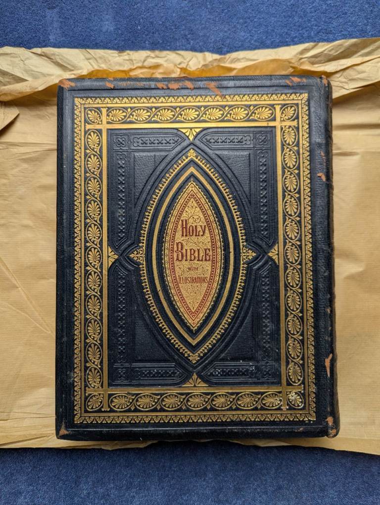 Beautiful leather bound antique illustrated Family Bible from 1877 for sale.