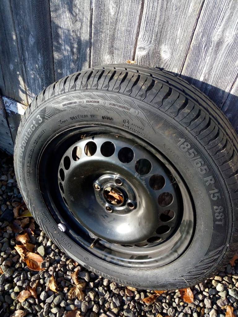 185/65 R15 tyre on metal rim.